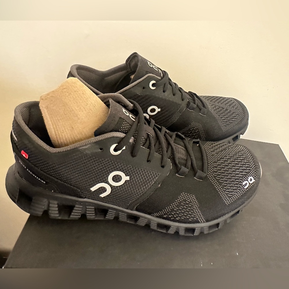 On running women black sneakers